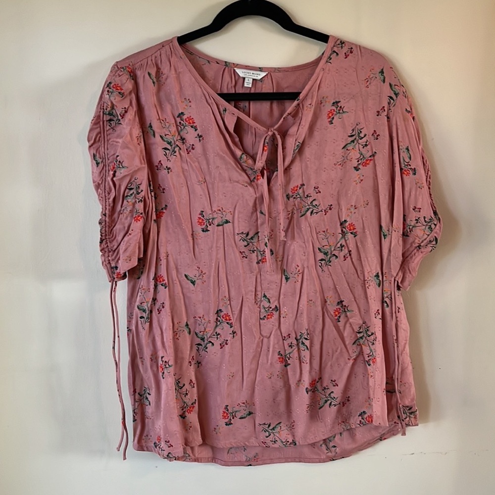 Woman’s Lg lucky blouse. Never worn.